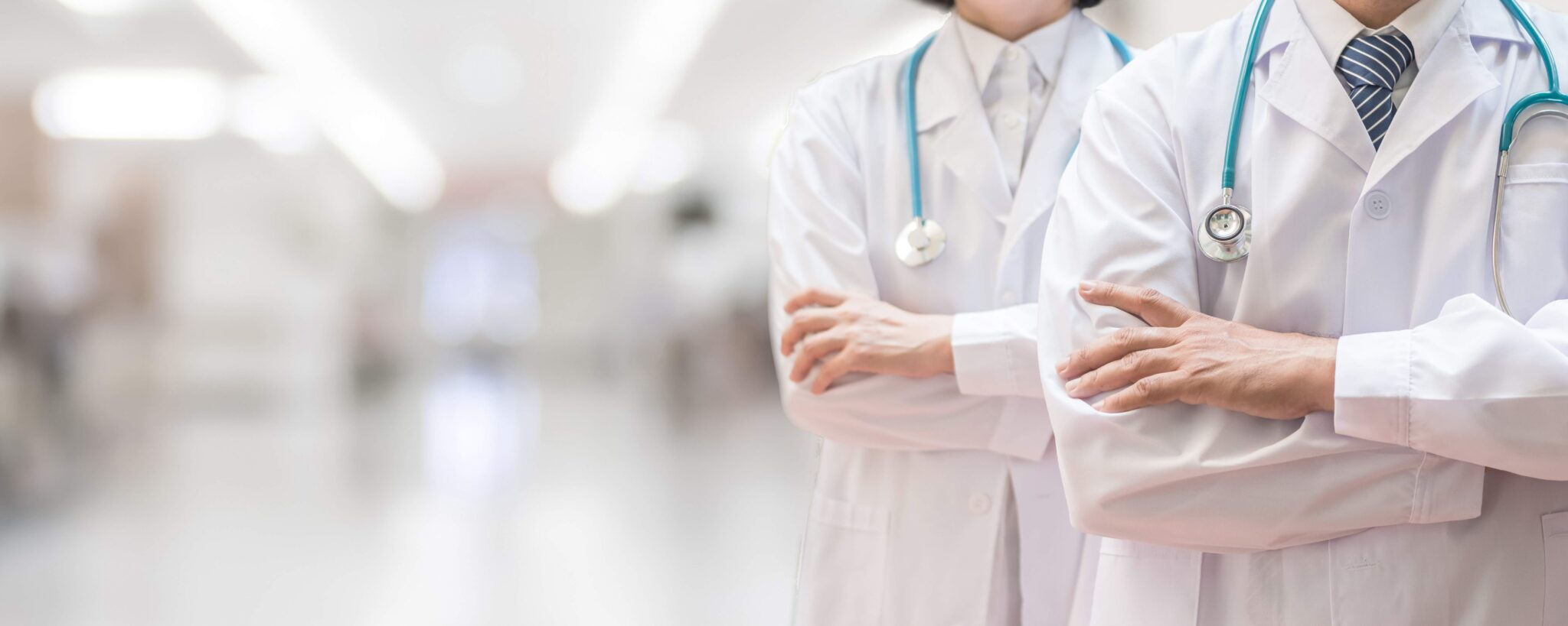 Two doctors waiting in a medical clinic