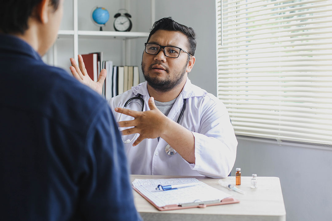 Doctor giving advice to a patient