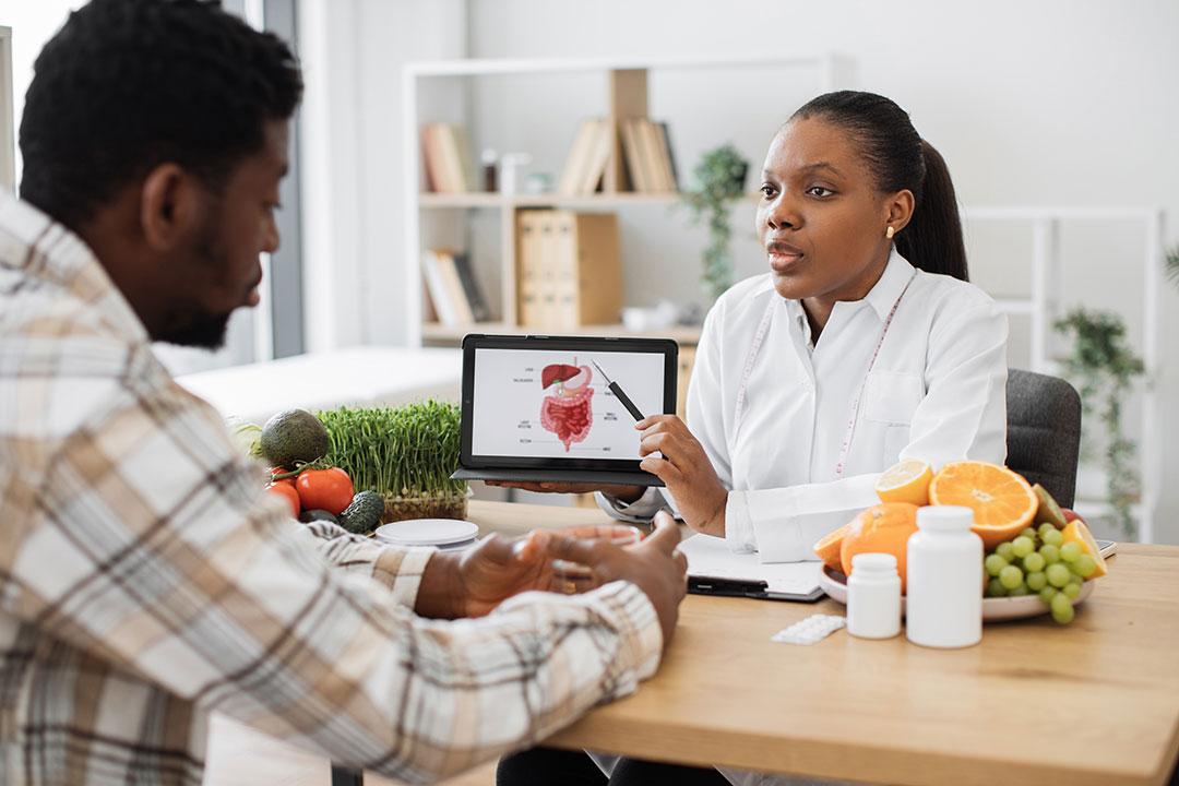 Woman explaining weight loss to someone looking to lose weight